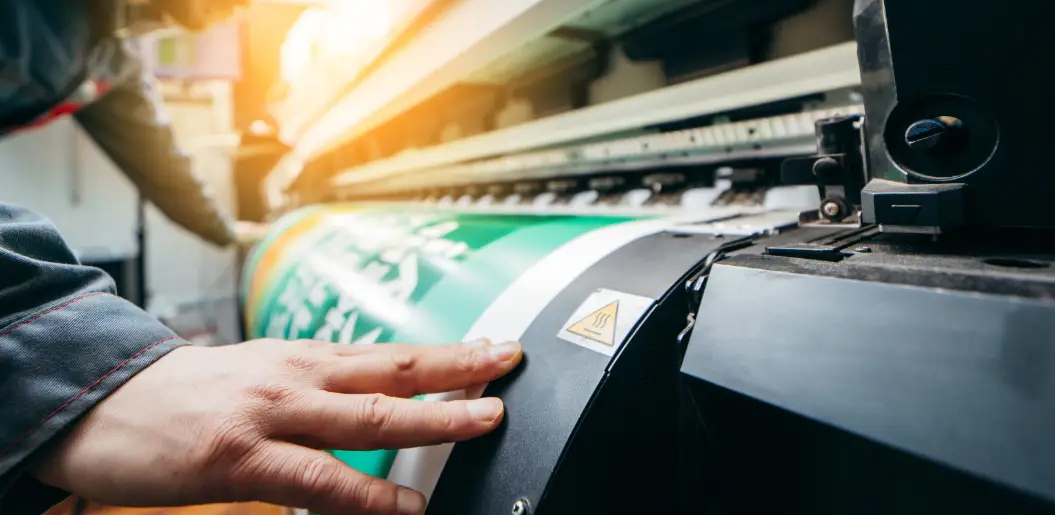 Technician working on a Mimaki printer