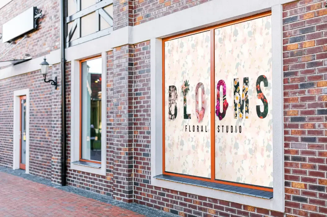 A graphic adhered to a store window