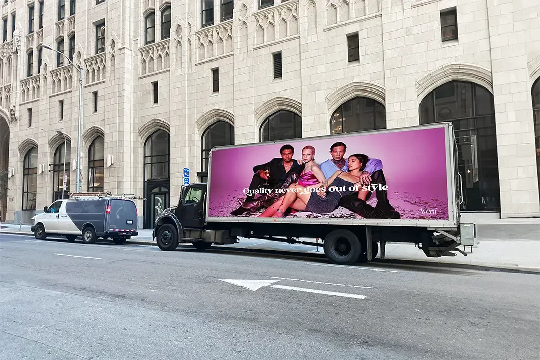A graphic advertisement on the side of a box truck