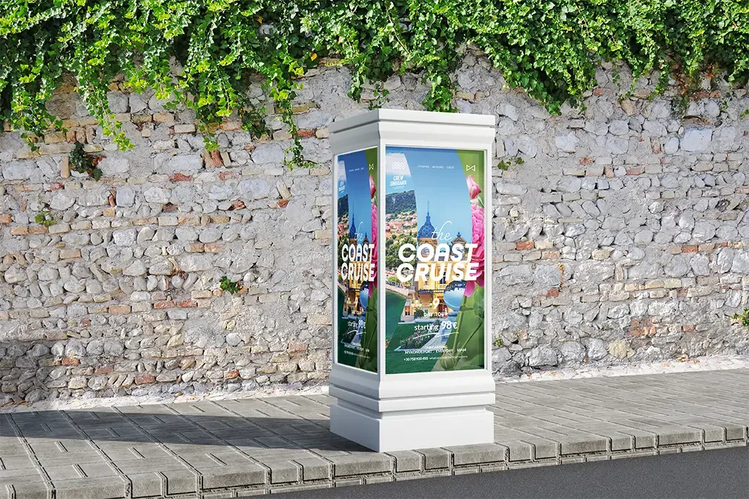 A 4 sided kiosk with printed advertisements on the sid