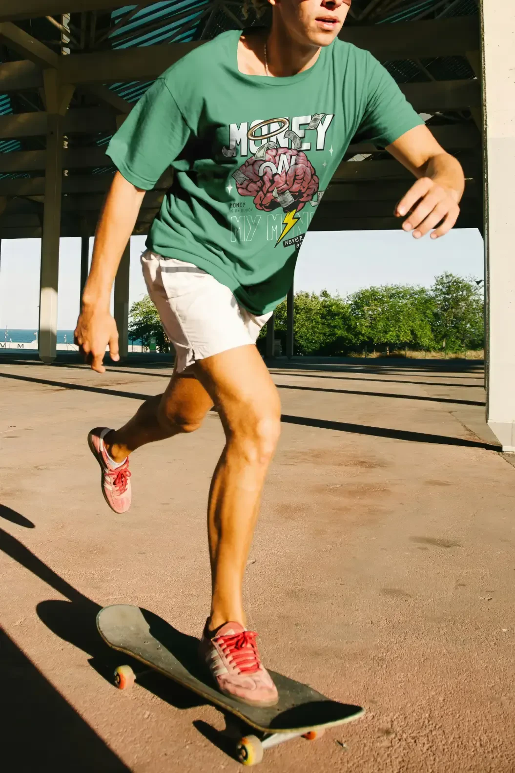 Man on skateboard wearing a printed t-shirt