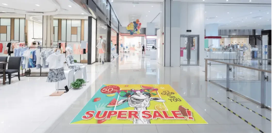 A graphic on the floor of a shopping mall