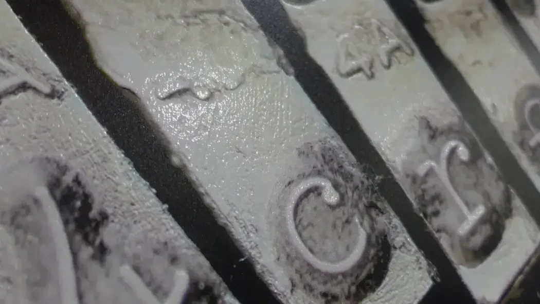 White texture with letters